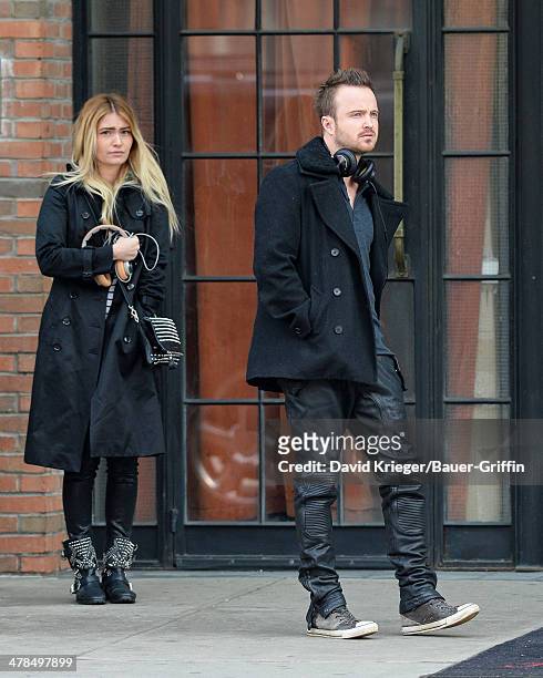 Aaron Paul and his wife Lauren Parsekian are seen on March 13, 2014 in New York City.