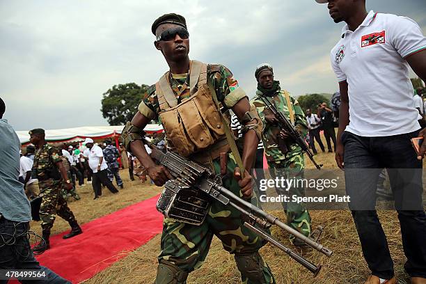 Elite military units keep guard as President Pierre Nkurunziza kicks off his official campaign for the presidency at a rally on June 25, 2015 in...