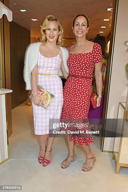 Charlotte Dellal and Andrea Dellal attend the opening of the Charlotte Olympia Brompton Cross store on June 25, 2015 in London, England.