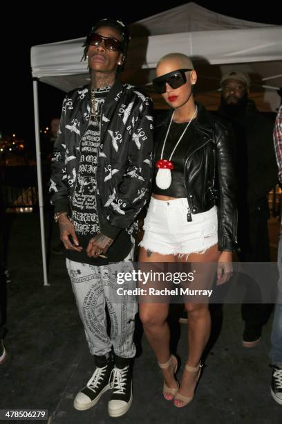 Rapper Wiz Khalifa and model Amber Rose attend the 2014 mtvU Woodie Awards and Festival on March 13, 2014 in Austin, Texas.