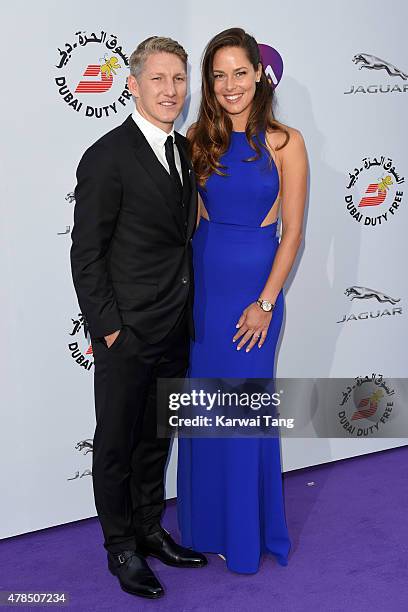 Bastian Schweinsteiger and Ana Ivanovic attend the WTA Pre-Wimbledon Party at Kensington Roof Gardens on June 25, 2015 in London, England.