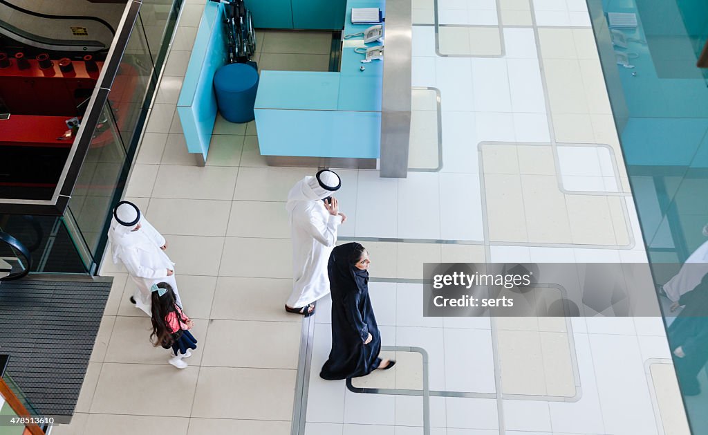 Arabian family at shopping mall