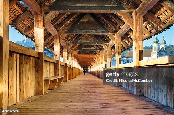 lucerne switzerland chapel bridge interior with paintings - chapel bridge stock pictures, royalty-free photos & images