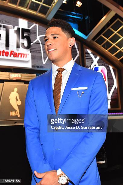 Devin Booker waits for the 2015 NBA Draft to begin at the Barclays Center on June 25, 2015 in the Brooklyn borough of New York City. NOTE TO USER:...