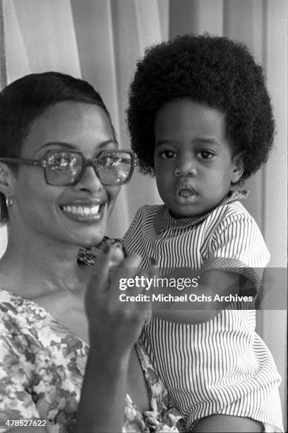 Soul singer Johnnie Taylor's wife Gerlean Rockett poses for a portrait with their daughter on September 29, 1973 in Los Angeles, CA.