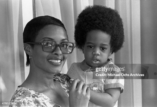 Soul singer Johnnie Taylor's wife Gerlean Rockett poses for a portrait with their daughter on September 29, 1973 in Los Angeles, CA.