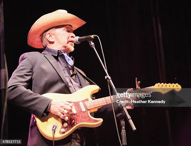 Musician Dave Alvin performs onstage at the USPS Hendrix Stamp Event + Los Lonely Boys during the 2014 SXSW Music, Film + Interactive at Butler Park...