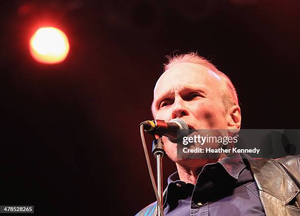 Musician Phil Alvin performs onstage at the USPS Hendrix Stamp Event + Los Lonely Boys during the 2014 SXSW Music, Film + Interactive at Butler Park...