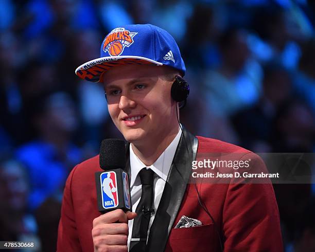 Kristaps Porzingis the 4th pick overall in the 2015 NBA Draft by the New York Knicks speaks to the media during the 2015 NBA Draft at the Barclays...