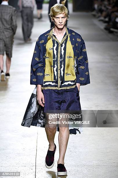 Model walks the runway during the Dries Van Noten Ready to Wear Menswear Spring/Summer 2016 show as part of Paris Fashion Week on June 25, 2015 in...