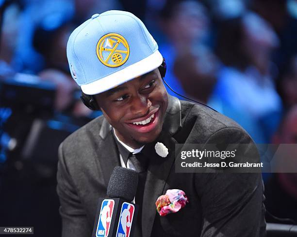 Emmanuel Mudiay the 7th pick overall in the 2015 NBA Draft by the Denver Nuggets poses for speaks to the media during the 2015 NBA Draft at the...