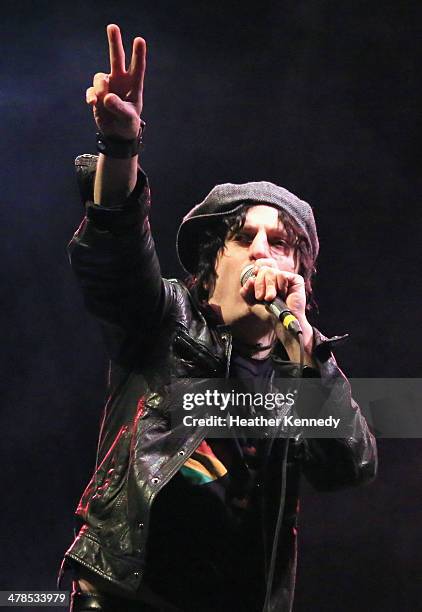 Musician Jesse Malin performs onstage at the USPS Hendrix Stamp Event + Los Lonely Boys during the 2014 SXSW Music, Film + Interactive at Butler Park...
