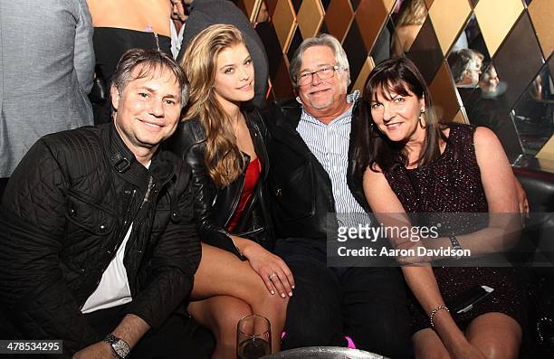Jason Binn, Nina Agdal, Micky Arison and Madeleine Arison attends at Wall at W Hotel on March 13, 2014 in Miami Beach, Florida.