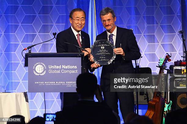 Secretary-General of the United Nations Ban Ki-moon and Executive Director, UN Global Compact Georg Kell speak onstage during the United Nations...