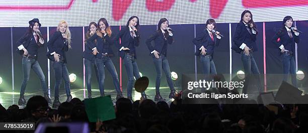 Girls' Generation perform onstage during the Mnet 'M Count Down' at CJ E&M Center on March 6, 2014 in Seoul, South Korea.