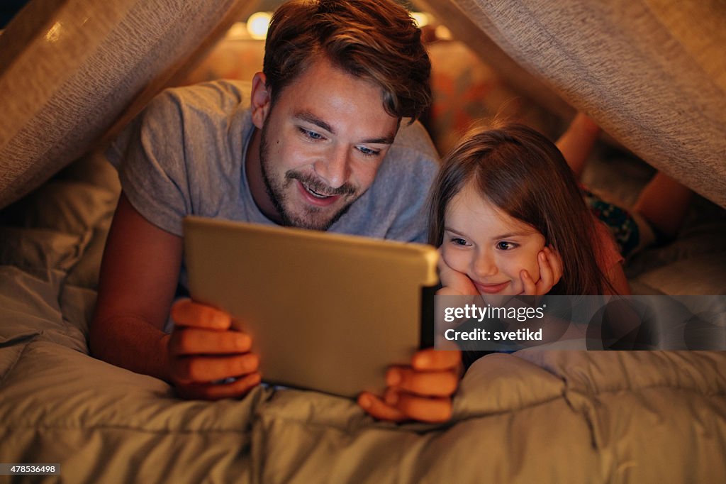 Father and daughter enjoying at home.