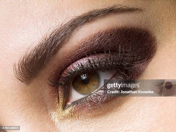 female eye, make up, close-up - smokey eyeshadow stock pictures, royalty-free photos & images