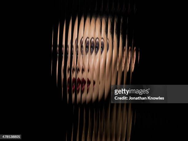 portrait of female through glass - repetição imagens e fotografias de stock
