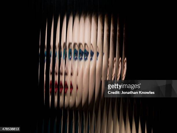 portrait of female through glass, side view - translucent glass stock pictures, royalty-free photos & images