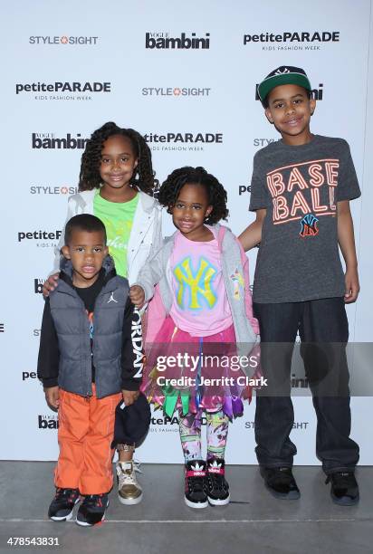 Lil' C, Jaden, Cyia and Carter Sabathia pose in CCandy Clothing seen at the Petite Parade Kids Fashion Show at 545 West 22nd Street on March 8, 2014...