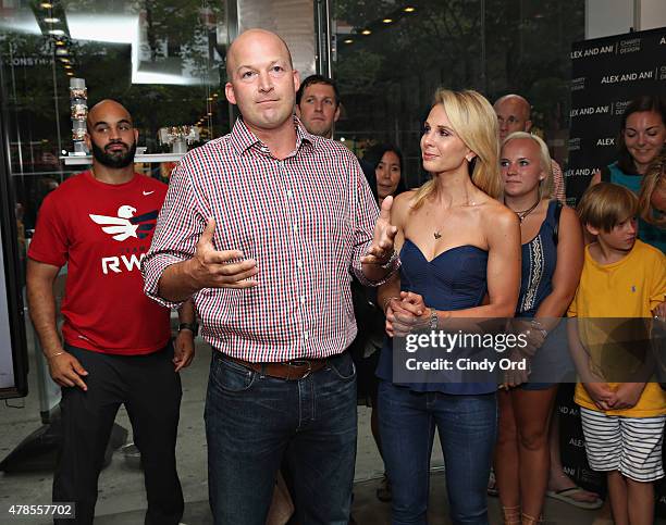 Tim Hasselbeck and Elisabeth Hasselbeck attend the Alex and Ani CHARMED BY CHARITY event and bangle launch party to celebrate the partnership with...