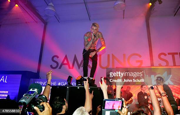 Rapper Machine Gun Kelly gives an intimate performance for fans at the Machine Gun Kelly Album Listening Party at the Samsung Studio LA across from...