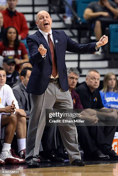 Head coach Herb Sendek of the Arizona State Sun Devils gestures to his players during a quarterfinal game of the Pac-12 Basketball Tournament against...