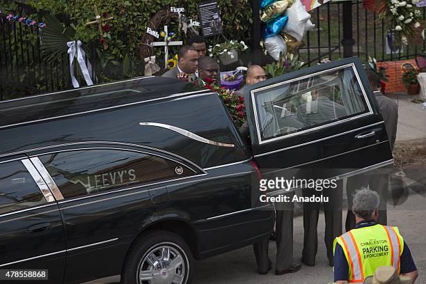 Men remove the body of Reverend Clementa Pinckney for the viewing at the Emanuel African Methodist Episcopal Church, a historic black church, who was...