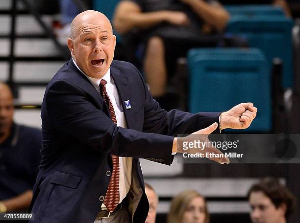 Head coach Herb Sendek of the Arizona State Sun Devils gestures to his players during a quarterfinal game of the Pac-12 Basketball Tournament against...