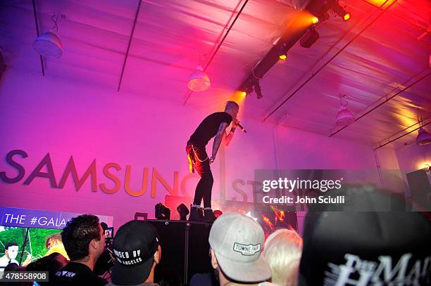 Rapper Machine Gun Kelly gives an intimate performance for fans at the Machine Gun Kelly Album Listening Party at the Samsung Studio LA across from...