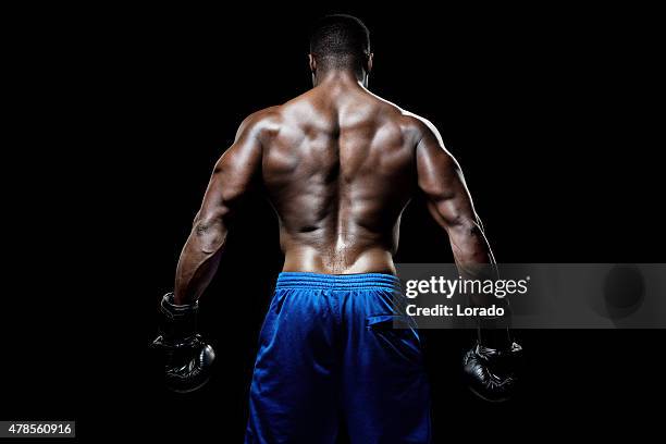 rear view of muscular black male - fighter portraits 2015 stockfoto's en -beelden