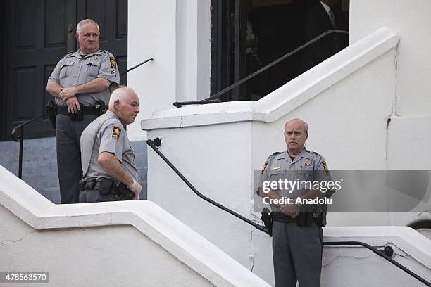 South Caroline State Troopers stand guard outside Emanuel African Methodist Episcopal Church, a historic black church, for a viewing of Reverend...