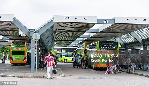 intercity bus- main station zob in berlin meinfernbus and flixbus - intercity stock pictures, royalty-free photos & images