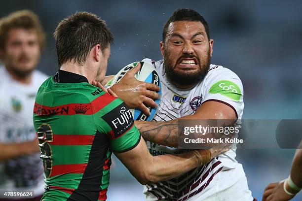 Luke Keary of the Rabbitohs tackles Feleti Mateo of the Eagles during the round 16 NRL match between the South Sydney Rabbitohs and the Manly Sea...