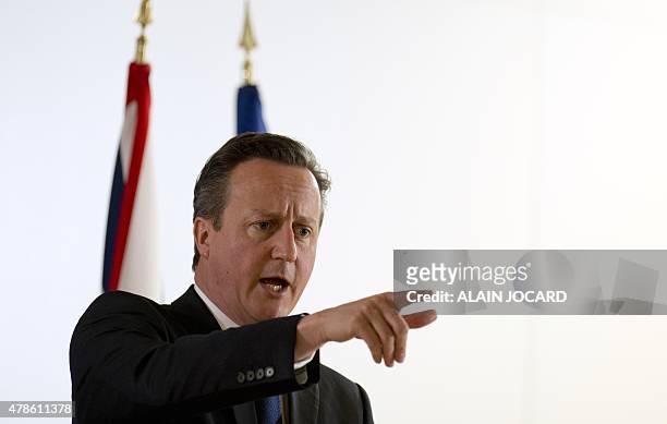 British Prime Minister David Cameron speaks during a press conference, on the second and last day of a European Union summit at the EU headquarters...