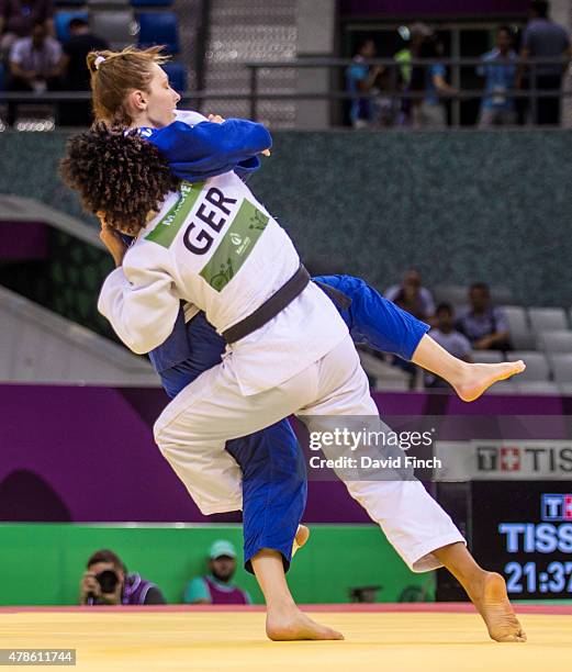 Miryam Roper of Germany catches Automne Pavia of France with a leg technique before armlocking her into submission to win the u57kg bronze medal by...