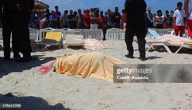 The bodies of people are seen after an armed attack on a tourist hotel in Sousse, east Tunisia, left at least 27 people dead, including foreigners,...