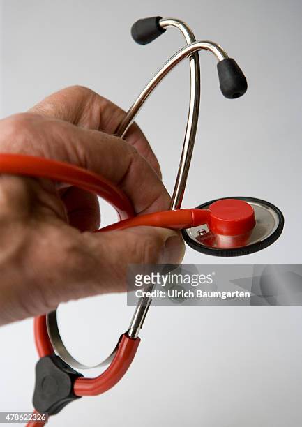 Hand with Stetoskop - Symbol photo on the topics Medicine, Medizin, doctor, medicine costs, hospital, etc.