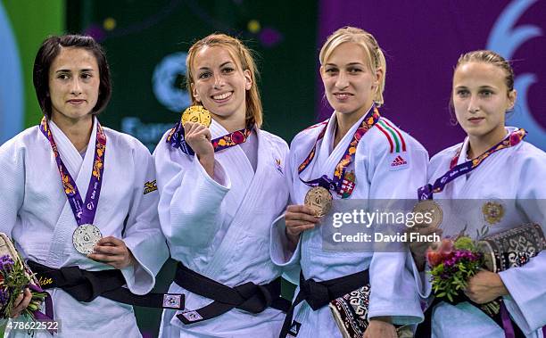 Under 48kg medallists Ebru Sahin of Turkey , Charline van Snick of Belgium , Eva Csernoviczki of Hungary and Irina Dolgova of Russia pose during the...