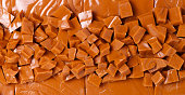 Background of brown toffee chunks