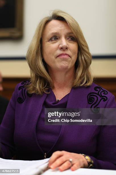 Air Force Secretary Deborah Lee James prepares to testify before the House Armed Services Committee during a hearing about the Air Force's FY2015...