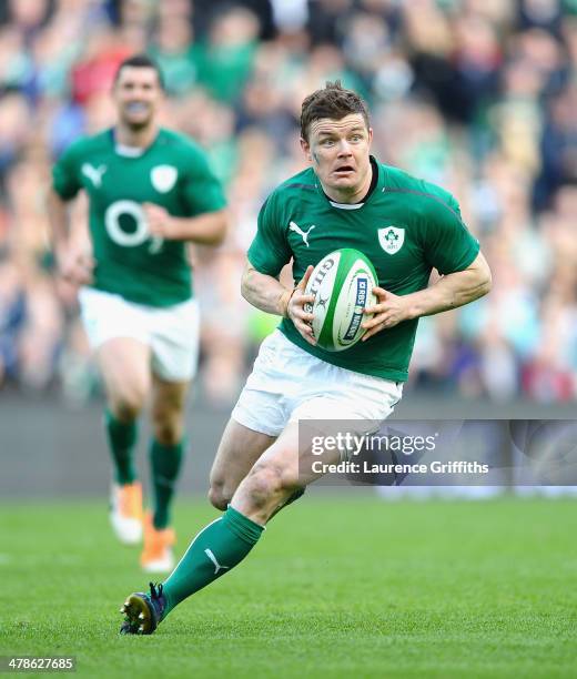 Brian O'Driscoll of Ireland in action during the RBS Six Nations match between Ireland and Italy at Aviva Stadium on March 8, 2014 in Dublin, Ireland.