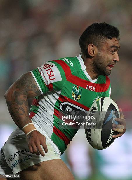 Nathan Merritt of the Rabbitohs runs with the ball during the round two NRL match between the Manly Warringah Sea Eagles and the South Sydney...