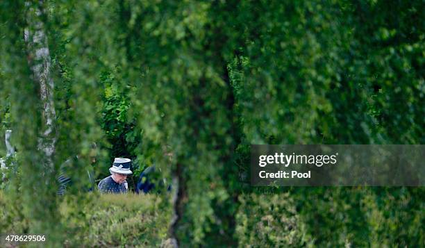 Queen Elizabeth II visits the concentration camp memorial at Bergen-Belsen on June 26, 2015 in Lohheide, Germany. The Queen and The Duke of Edinburgh...