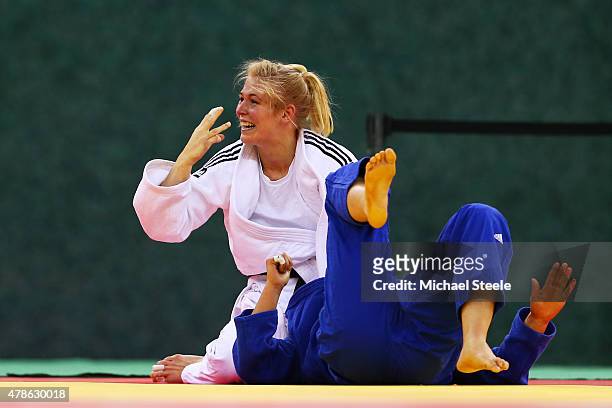 Kim Polling of Netherlands celebrates winning the gold medal in the Women's 70kg gold medal match against Laura Vargas Koch of Germany during day...