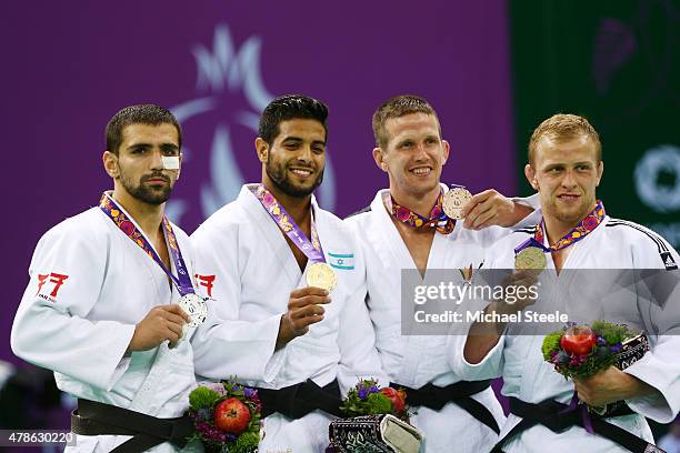 Silver medalist Nugzari Tatalashvili of Georgia, gold medalist Sagi Muki of Israel, bronze medalist Dirk van Tichelt of Belgium and bronze medalist...