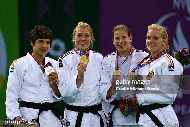 Silver medalist Laura Vargas Koch of Germany, gold medalist Kim Polling of the Netherlands and bronze medalists Bernadette Graf of Austria and...