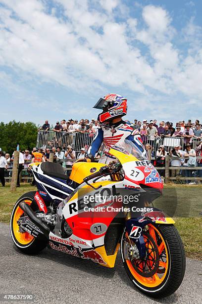 Double Moto GP champion Casey Stoner with his Honda at Goodwood on June 26, 2015 in Chichester, England.