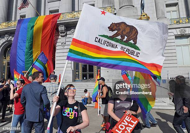 Supporters celebrate outside City Hall after the U.S. Supreme Court same-sex marriage ruling in San Francisco, California, U.S., on Friday, June 26,...