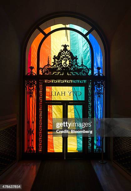 Rainbow flag is seen covering the entrance to City Hall after the U.S. Supreme Court same-sex marriage ruling in San Francisco, California, U.S., on...